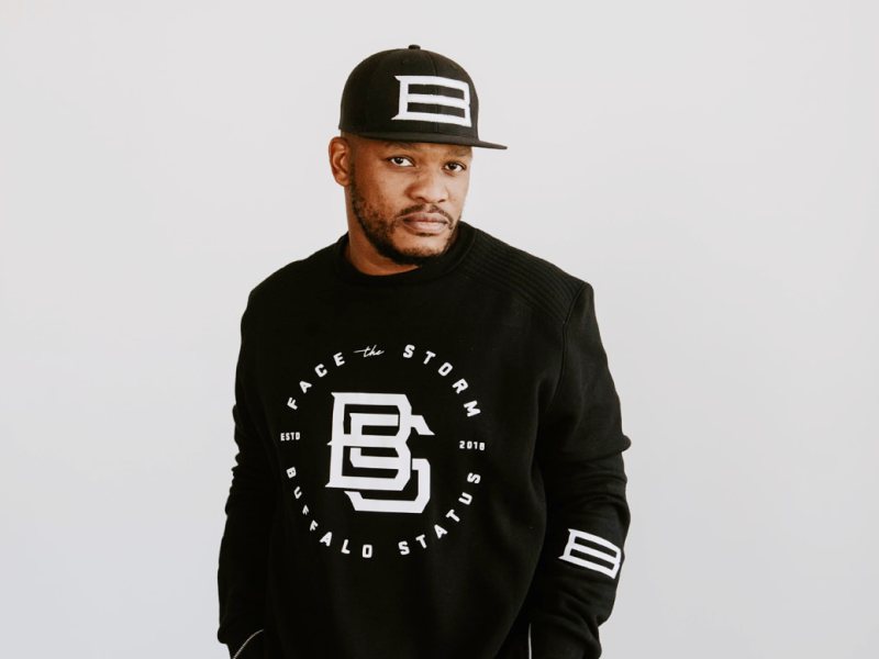 Black cap and sweatshirt with a white graphic